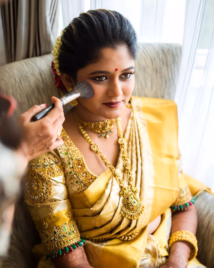 Powder brush setting a bride's base